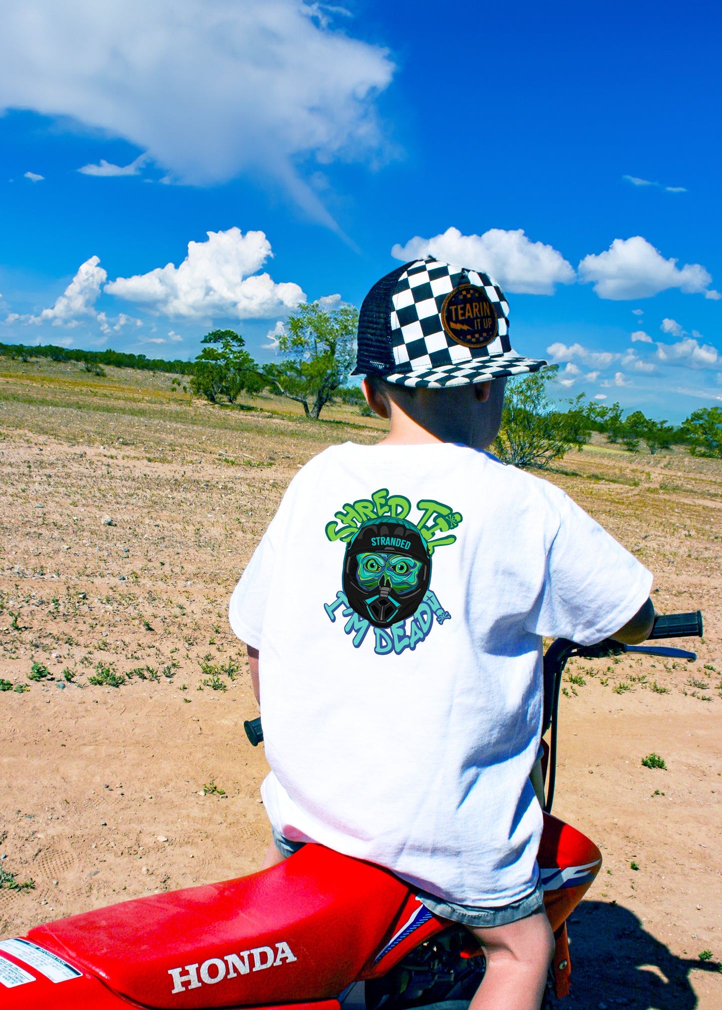 Boy on dirt bike modeling Shred Til Im Dead Shirt